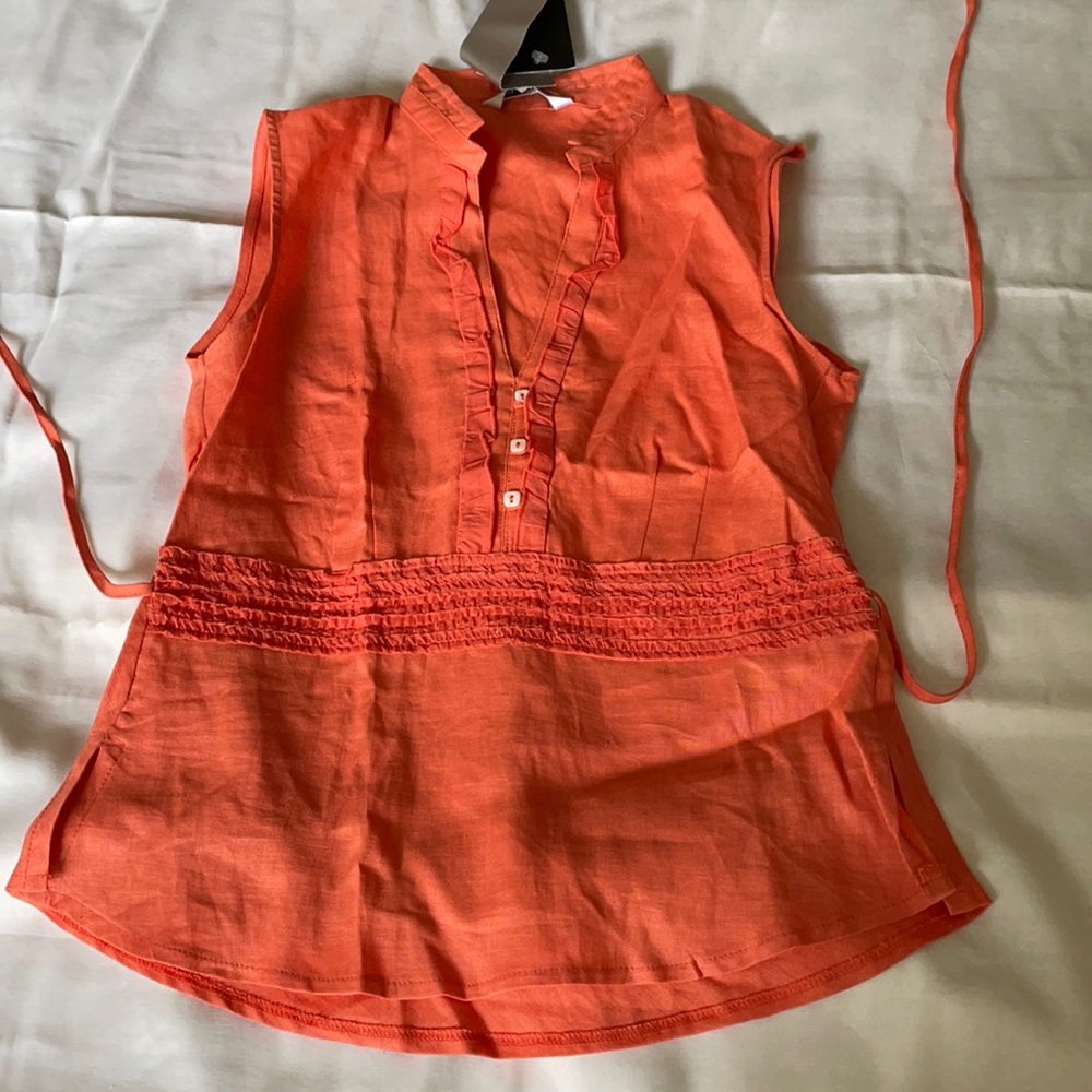 Girl’s orange top